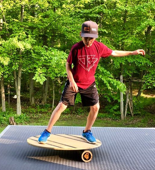 Featured athlete:  Cole Pranger displays his balance board fluid movements